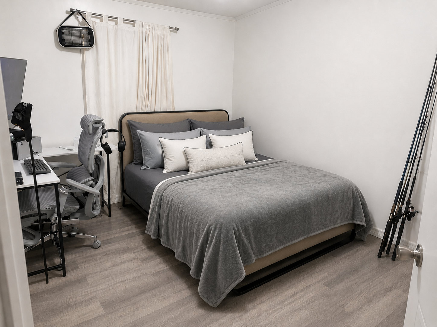 Bedroom with sleigh bed, mantle and warm lighting