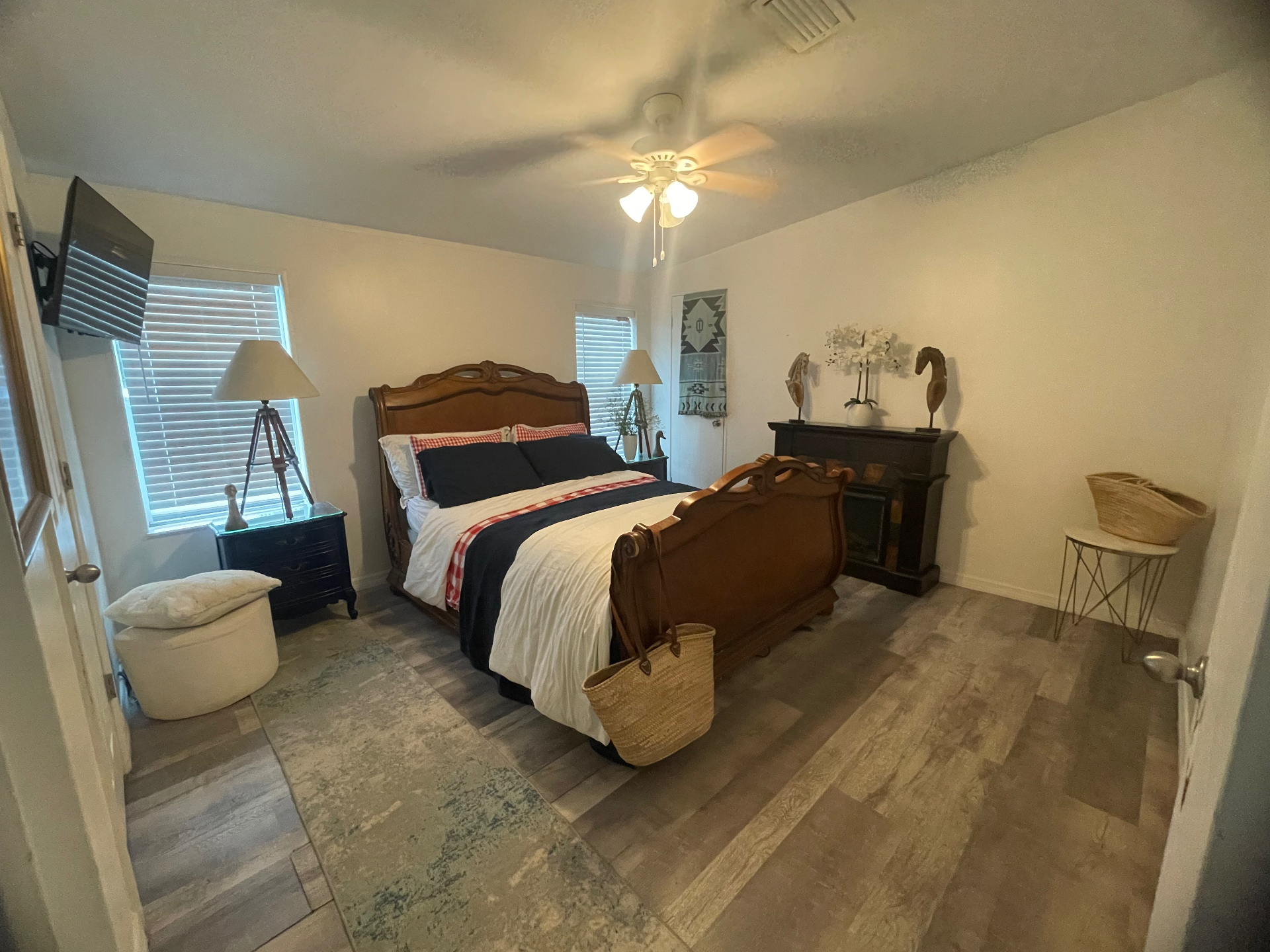 Bedroom with modern king bed and desk workspace
